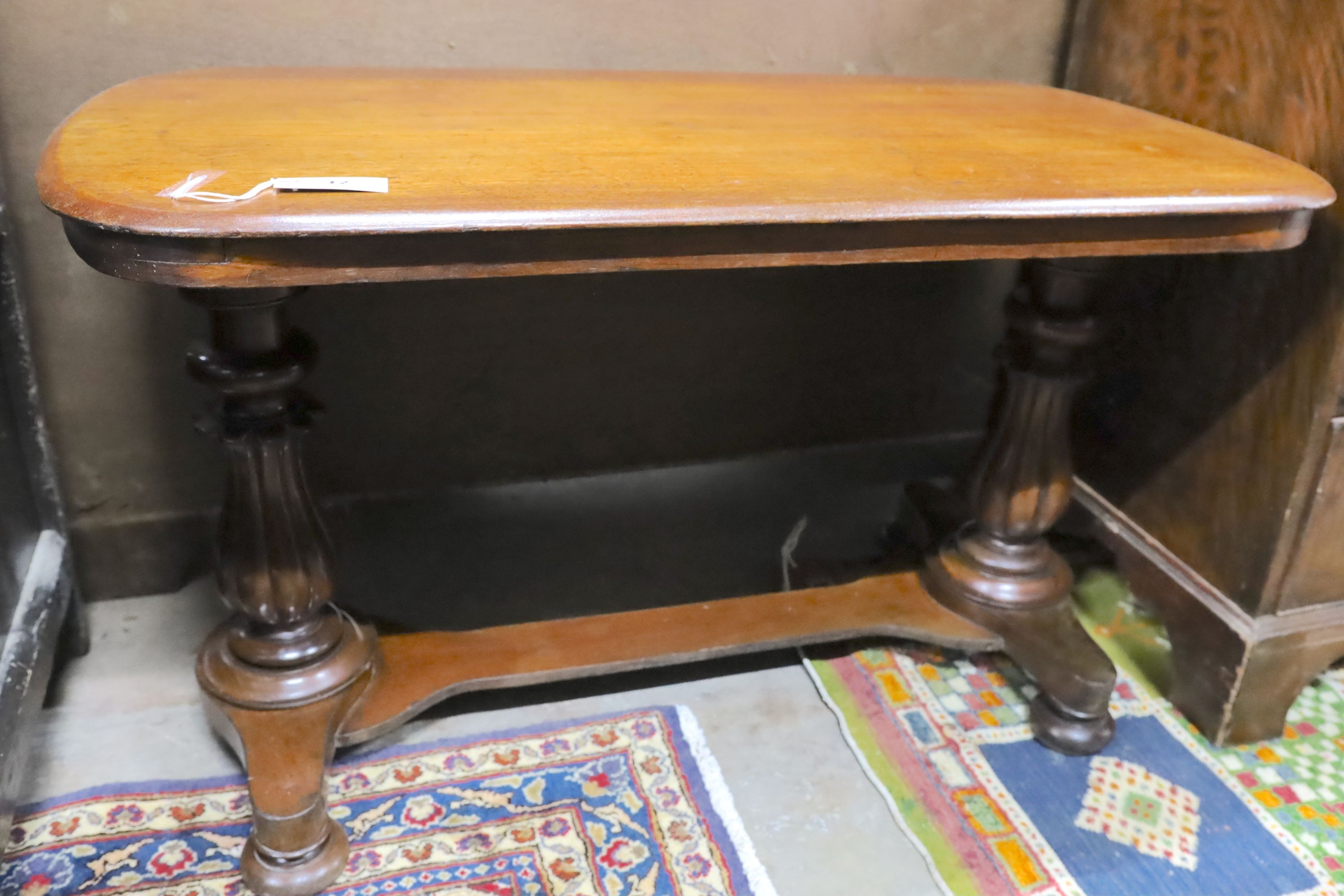 A George II mahogany folding card table on carved cabriole legs, width 76cm, depth 38cm, height 72cm